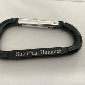 Vintage Suburban Hummer key ring. Black and silver
